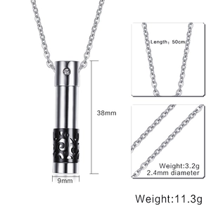 Detail showing cylindrical urn pendant size 38mm by 9mm with black filigree and rhinestone
