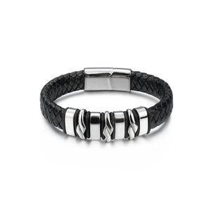 Detail of black braided leather men's bracelet with magnetic steel clasp and metal rings
