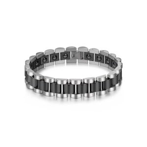 Close-up of black ceramic and stainless steel links with magnetic health stones