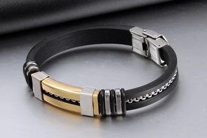 Detailed shot of silicone band with gold stainless steel inlay and secure buckle
