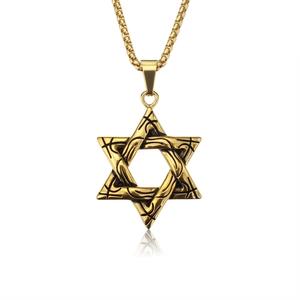 Vue détaillée du pendentif étoile de David dorée avec gravures de vignes noires vintage