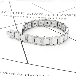 Detail of 12mm stainless steel and ceramic magnetic link bracelet with secure fold clasp
