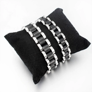 Minimalist ceramic and stainless steel link bracelet with dual-tone black and silver finish