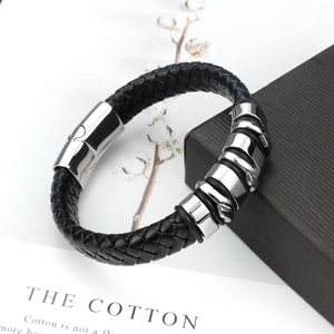 Men's black braided leather bracelet with magnetic stainless steel clasp on a gift box