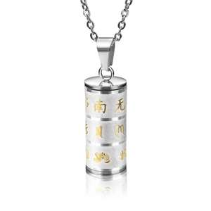 Detail of a cylindrical religious pendant with golden Sanskrit mantra and lotus pattern