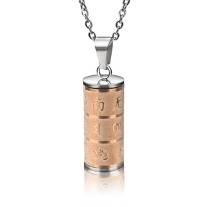 Detail of a rotating mantra cylinder pendant in rose gold and silver stainless steel