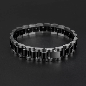 Men's titanium steel magnetic health bracelet with black ceramic links and folding clasp