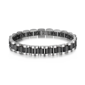Sleek stainless steel and black ceramic health bracelet featuring magnetic therapy elements