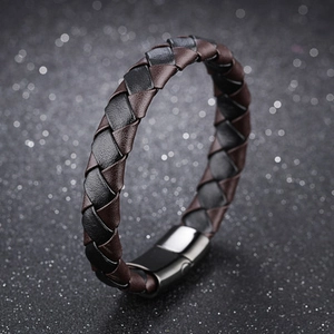 Men's braided leather bracelet with two-tone weave and polished magnetic metal clasp