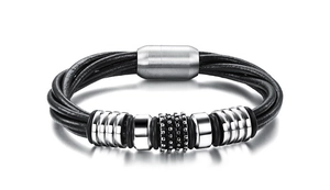 Close-up of men's multi-layer braided leather bracelet with magnetic steel clasp