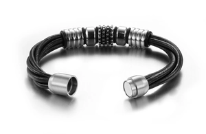 Detail of multi-layer black braided leather bracelet with stainless steel magnetic clasp
