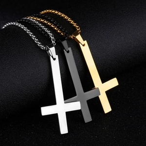 Three-piece stainless steel inverted cross pendant necklace set in silver, gold, and black
