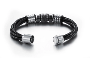 Close-up of black multilayer leather bracelet with carved stainless steel beads and clasp