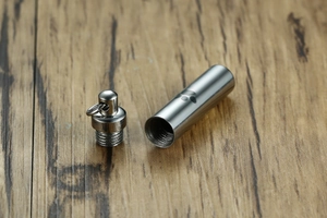 Macro shot showing internal screw thread detail of stainless steel pet urn pendant