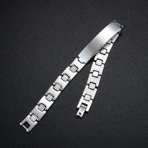 Men's silver stainless steel ID bracelet with polished engraving plate and grid link design