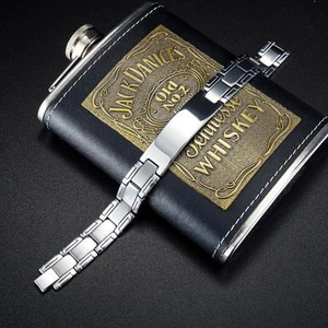 Polished stainless steel men's chain bracelet featuring an engravable rectangular plate
