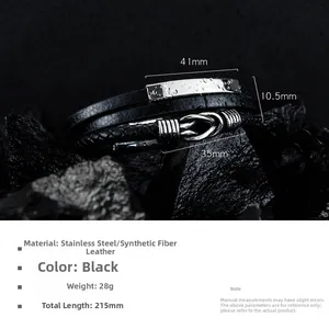 Detail of multi-layer black woven leather bracelet for men with stainless steel clasp