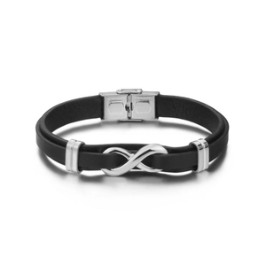 Macro detail of black leather bracelet featuring a silver infinity symbol and steel clasp