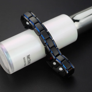 Men's titanium steel bracelet with blue accents and magnetic links for wellness