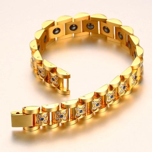 Gold magnetic therapy couple bracelet with blue crystal accents and polished finish