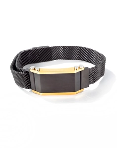Detail of black mesh band bracelet with gold and black plate featuring silver rivets