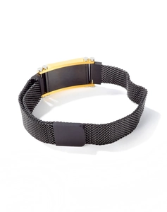 Detail of black mesh titanium steel bracelet with gold-trimmed rectangular plate