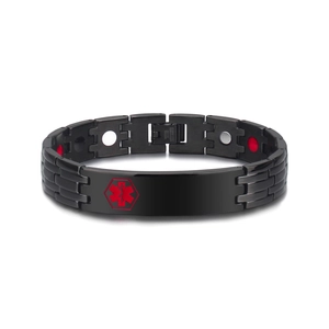 Macro shot of black stainless steel medical bracelet with magnetic therapy inserts