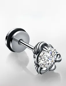 Detailed macro view of a titanium crown stud earring with zircon and rope texture detail