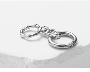 Detailed macro view of silver bamboo-texture stainless steel OT toggle jewelry clasp