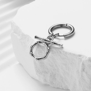 Minimalist silver stainless steel hoop earrings featuring a unique bamboo joint design