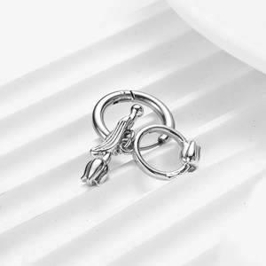Minimalist stainless steel hoop earrings with tulip flower pendants in polished silver