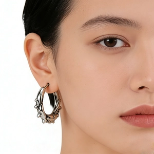 Punk style stainless steel hoop earrings with spiked tooth design for men and women