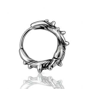 Vintage punk rock style stainless steel wolf tooth hoop earrings with sharp thorn design
