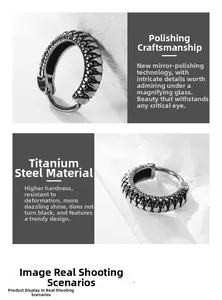 Macro detail of silver titanium steel huggie hoops with vintage textured engraving