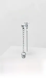 Detail view of silver stainless steel drop earring with chain and vertical bar element