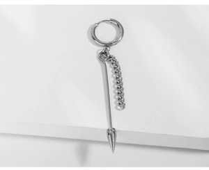 Macro detail of silver stainless steel hoop earring with bullet spike and chain pendant