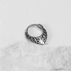 Retro stainless steel cross piercing jewelry with vintage filigree patterns on stone base