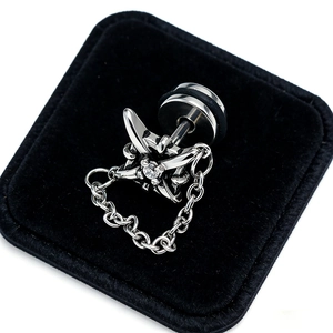 Detail of silver stainless steel cross earring with zircon stone and hanging chain