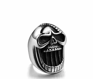 Detailed close-up of a silver skull bottle opener ring made of durable titanium steel