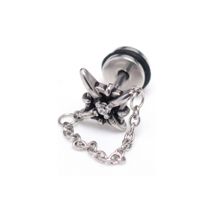 Detail of dark gothic stainless steel cross earring with white zircon and chain