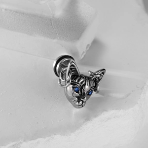 Vintage silver cat head stud earring with blue gem eyes and engraved texture