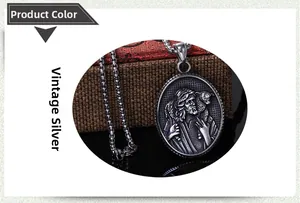 Detail of antique silver religious warrior pendant with Jesus relief and link chain