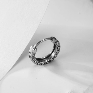 Retro stainless steel hoop earring with embossed dot pattern and hinged closure