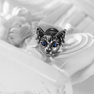 Gothic silver sphinx cat stud earrings with blue gemstone eyes and ear ring piercings