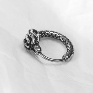 Retro hip-hop dragon head earring with detailed scales and vintage silver finish