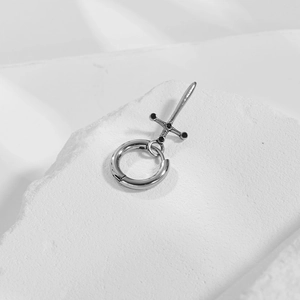 Vintage stainless steel hoop earring with detailed silver sword pendant and black stones