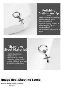 Detailed view of silver titanium steel Ankh cross hoop earring with a polished finish