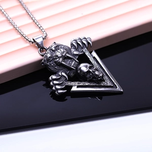 Retro stainless steel saber-toothed tiger skull pendant for men on a black box chain