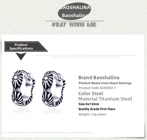 Detailed specs of stainless steel hoop earrings with vintage relief floral patterns