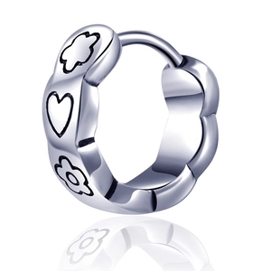 Graffiti flower silver hoop earrings with heart patterns and wavy edges on white background